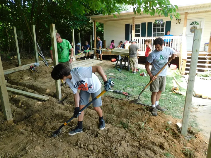 Volunteers working on a home repair project